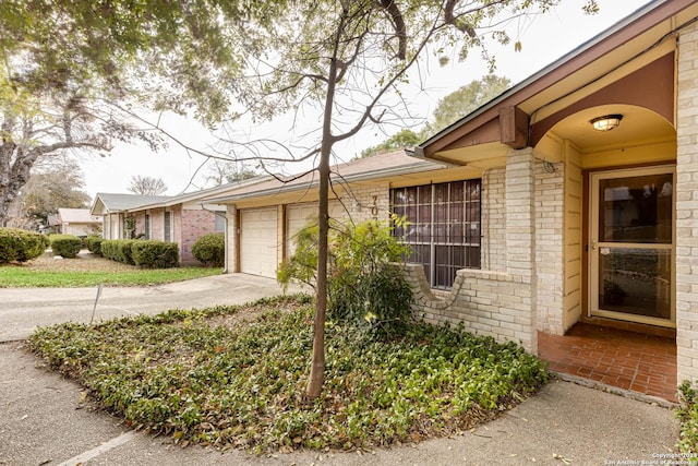 view of property exterior with a garage