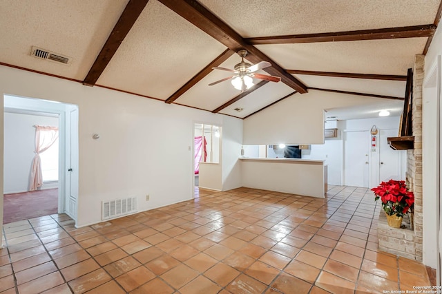 unfurnished living room with light tile patterned floors, a textured ceiling, lofted ceiling with beams, and ceiling fan