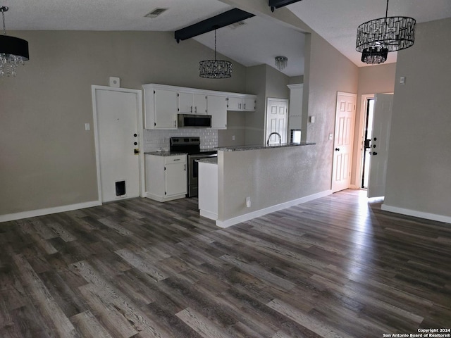 kitchen featuring appliances with stainless steel finishes, a notable chandelier, white cabinets, decorative light fixtures, and beamed ceiling