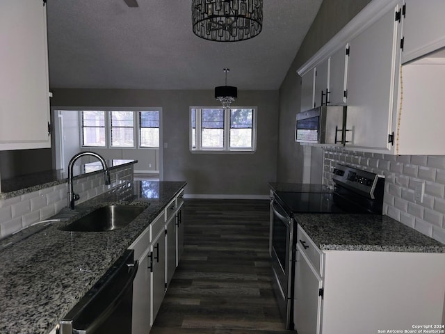 kitchen featuring sink, stainless steel electric range, dishwasher, decorative backsplash, and white cabinets