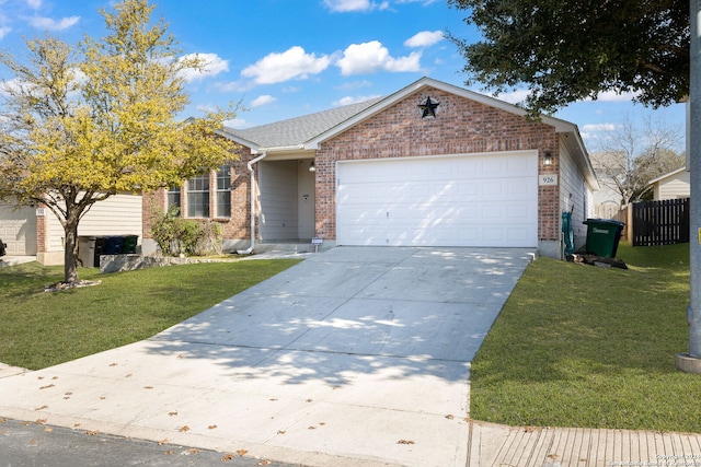 ranch-style house with a garage and a front lawn