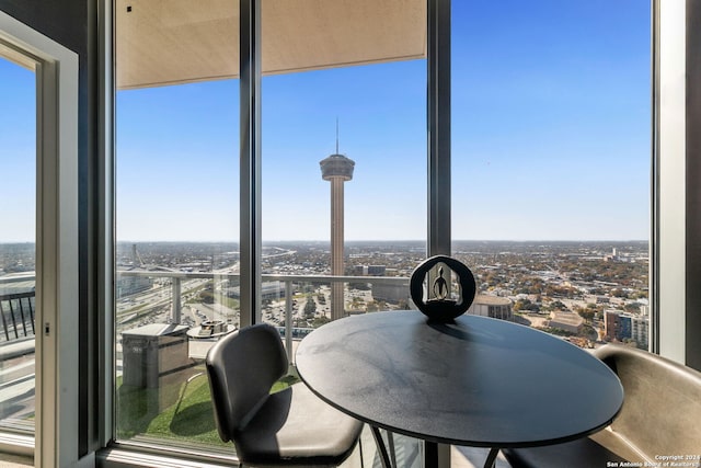 dining room featuring a wall of windows