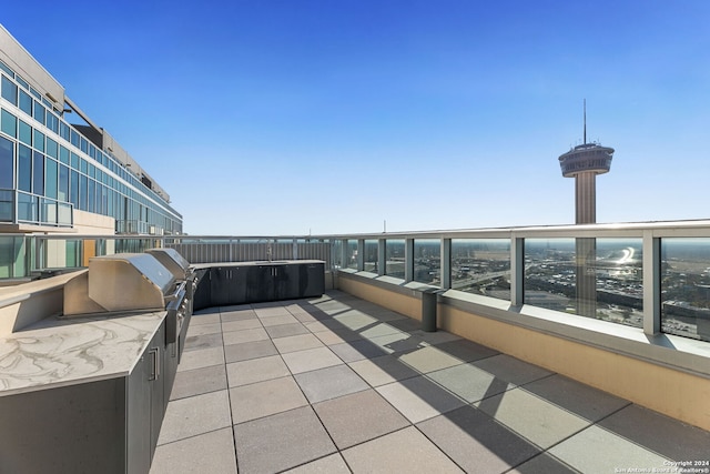 view of patio featuring an outdoor kitchen