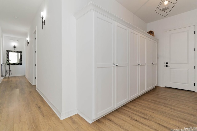 hallway featuring light wood-type flooring