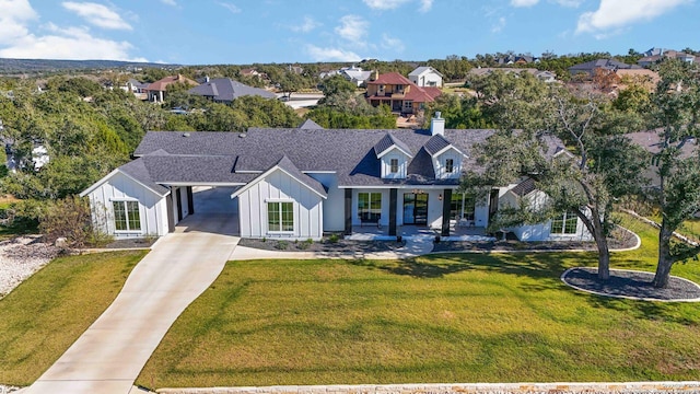 view of front of home with a front lawn and a porch