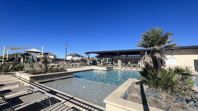 view of pool featuring a patio