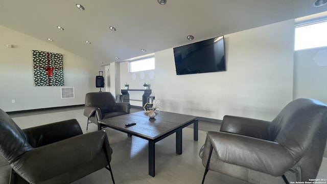 living room with vaulted ceiling