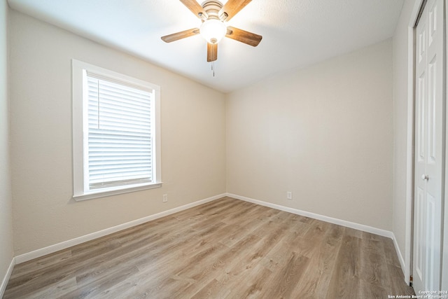 spare room featuring light wood-type flooring