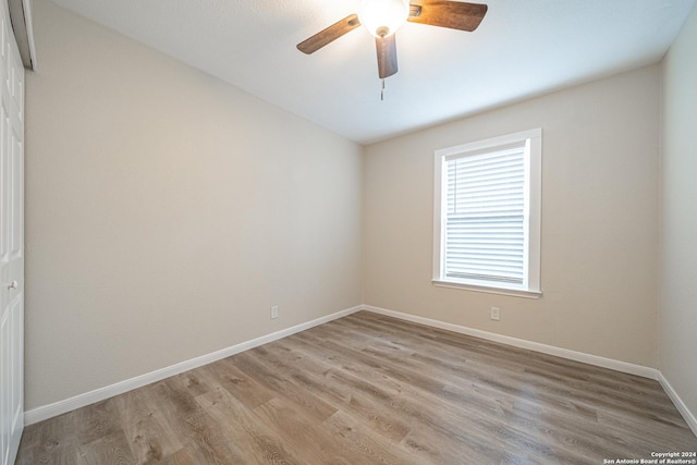 unfurnished room with light hardwood / wood-style floors