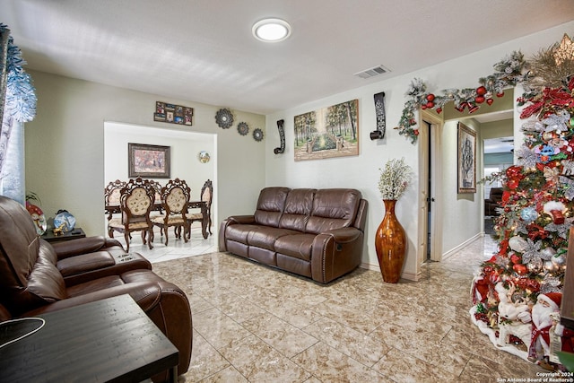 living room featuring light tile patterned flooring