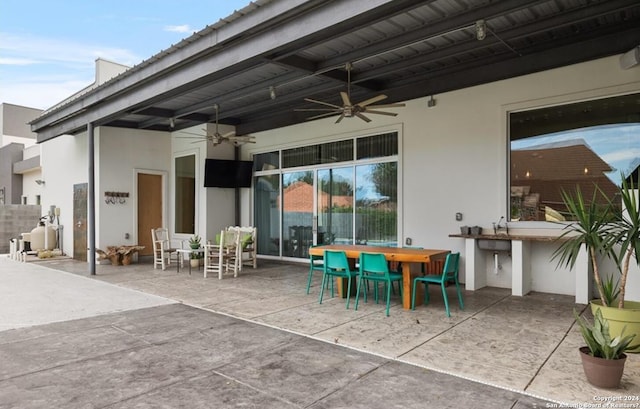 view of patio / terrace with ceiling fan