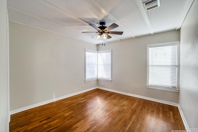 empty room with hardwood / wood-style flooring and ceiling fan