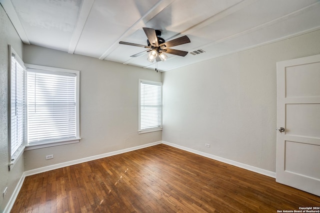 unfurnished room featuring ceiling fan, a healthy amount of sunlight, and wood-type flooring