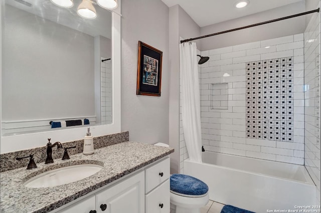 full bathroom with shower / bath combo, vanity, and toilet