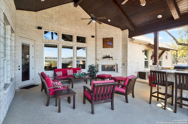 769 Pacific Pl, Spring Branch, TX 78070 - view of patio / terrace featuring an outdoor living space with a fireplace, ceiling fan, area for grilling, and a bar