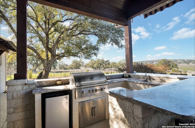 769 Pacific Pl, Spring Branch, TX 78070 - view of patio / terrace featuring an outdoor kitchen