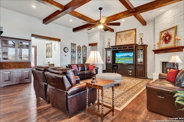 769 Pacific Pl, Spring Branch, TX 78070 - living room featuring a ceiling fan, beam ceiling, coffered ceiling, dark wood finished floors, and a fireplace