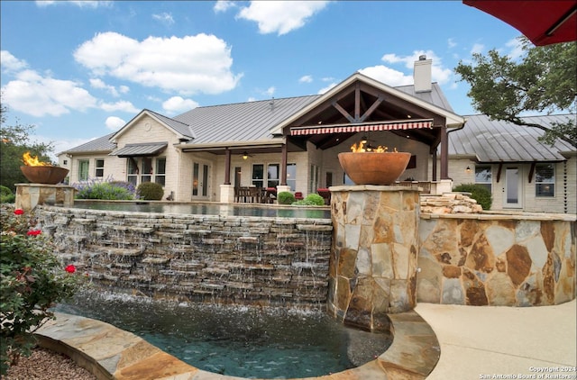 view of pool with ceiling fan