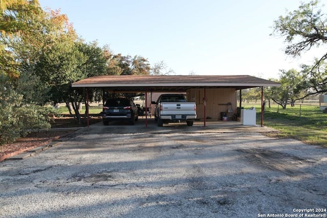 view of car parking with a carport