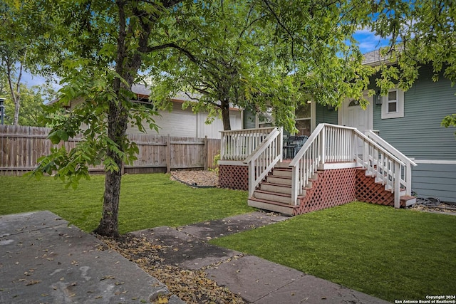403 Queen Anne Ct, San Antonio, TX 78209 - exterior space featuring fence private yard and a front lawn