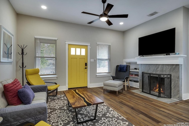 403 Queen Anne Ct, San Antonio, TX 78209 - living room with baseboards, visible vents, a high end fireplace, wood finished floors, and recessed lighting
