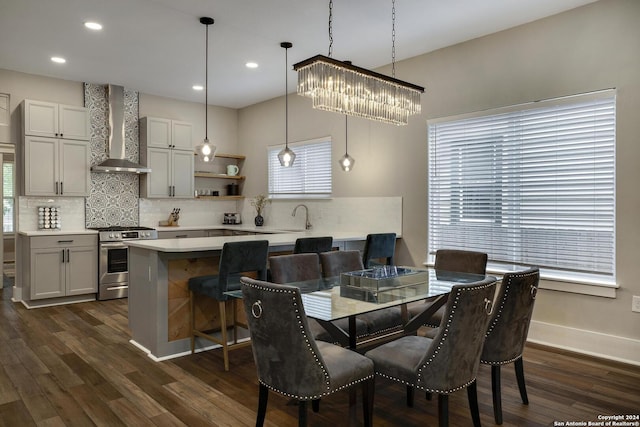 403 Queen Anne Ct, San Antonio, TX 78209 - dining area featuring a healthy amount of sunlight, dark wood finished floors, and baseboards