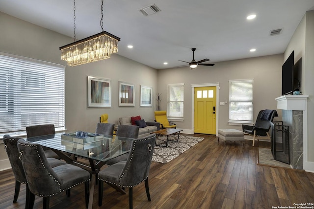 403 Queen Anne Ct, San Antonio, TX 78209 - dining room featuring a tile fireplace, visible vents, dark wood finished floors, and recessed lighting