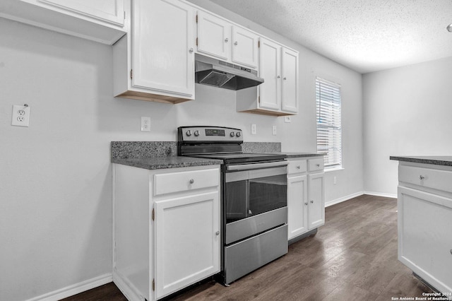 kitchen with white cabinetry, stainless steel range with electric cooktop, dark wood-type flooring, and a textured ceiling