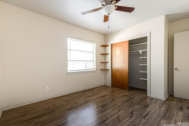 unfurnished bedroom with a closet, ceiling fan, and dark hardwood / wood-style floors