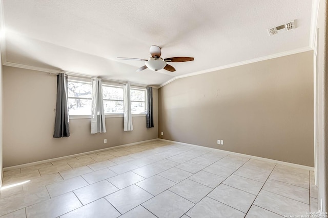 spare room featuring a textured ceiling, ceiling fan, light tile patterned flooring, and crown molding