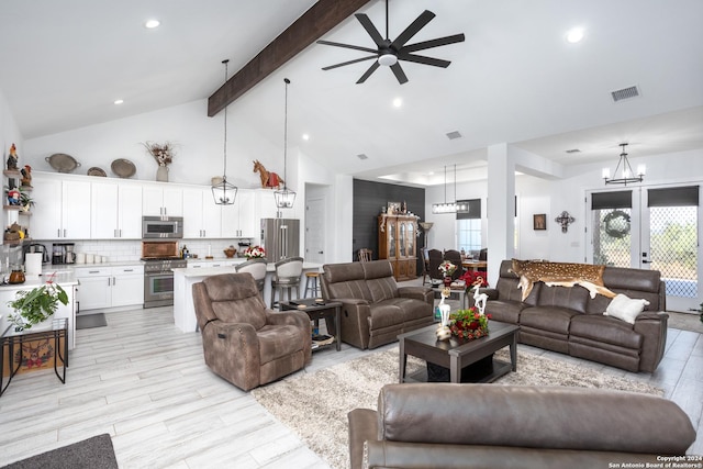 living room with french doors, light hardwood / wood-style flooring, beamed ceiling, high vaulted ceiling, and ceiling fan with notable chandelier