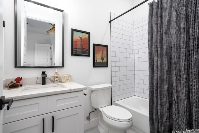 full bathroom featuring vanity, shower / bath combination with curtain, and toilet