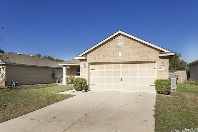 ranch-style house with a front lawn and a garage