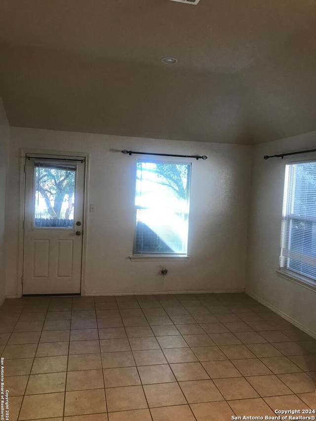 entrance foyer featuring light tile patterned flooring