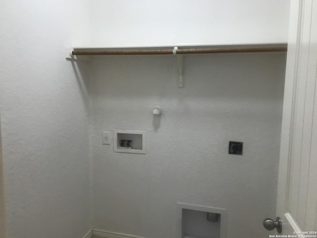 laundry room with hookup for an electric dryer, hookup for a gas dryer, and washer hookup