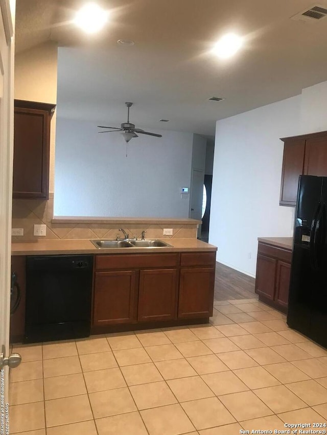 kitchen with ceiling fan, sink, tasteful backsplash, light tile patterned floors, and black appliances