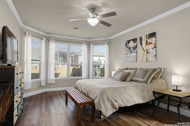 bedroom with multiple windows, ceiling fan, crown molding, and dark wood-type flooring