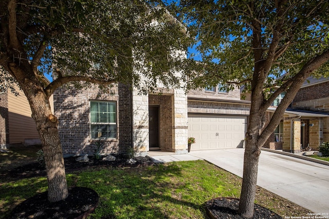 view of front of property featuring a garage