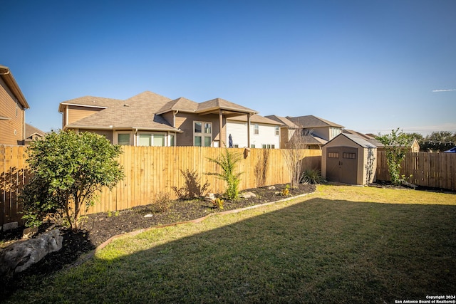 view of yard with a storage shed