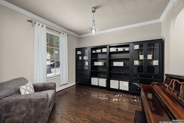 sitting room featuring crown molding and dark wood-type flooring