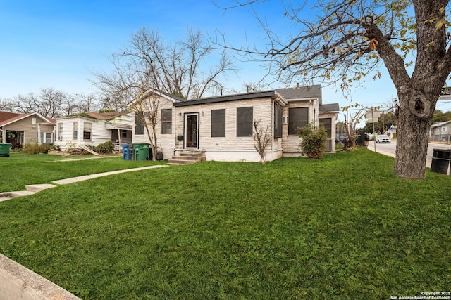 view of front of home with a front yard