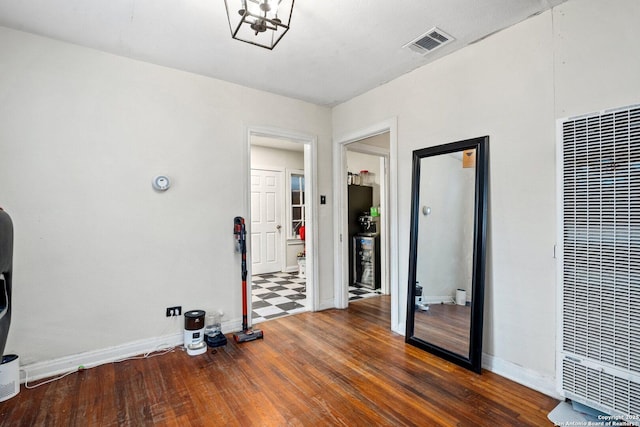 interior space with dark hardwood / wood-style floors