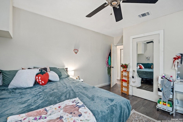 bedroom featuring ceiling fan and dark wood-type flooring