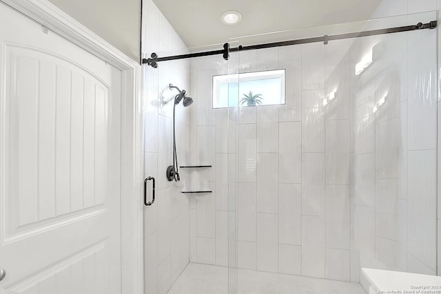 bathroom with an enclosed shower