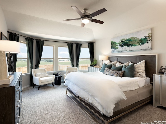 bedroom featuring light carpet, ceiling fan, and lofted ceiling