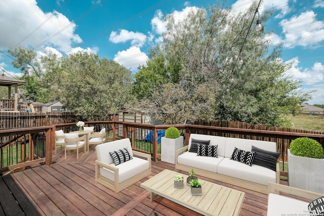 deck featuring an outdoor living space