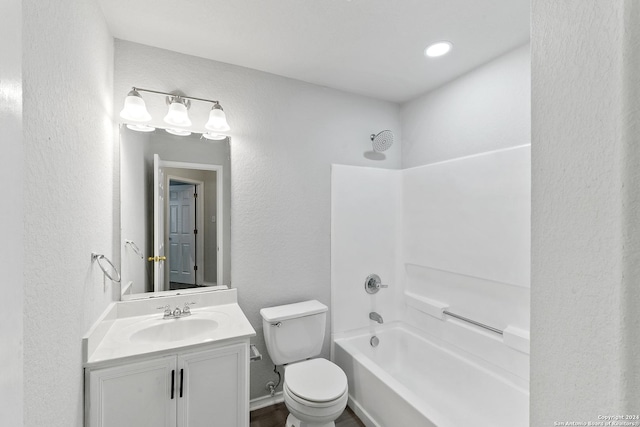 full bathroom with shower / bathing tub combination, vanity, and toilet