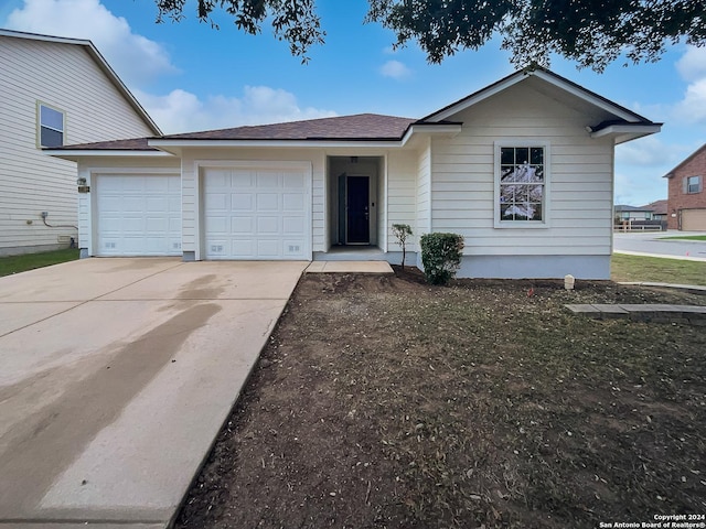 view of front of property with a garage