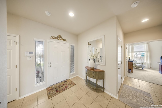 foyer with light tile patterned floors