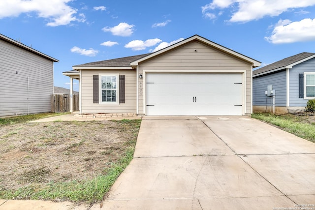 single story home with a garage